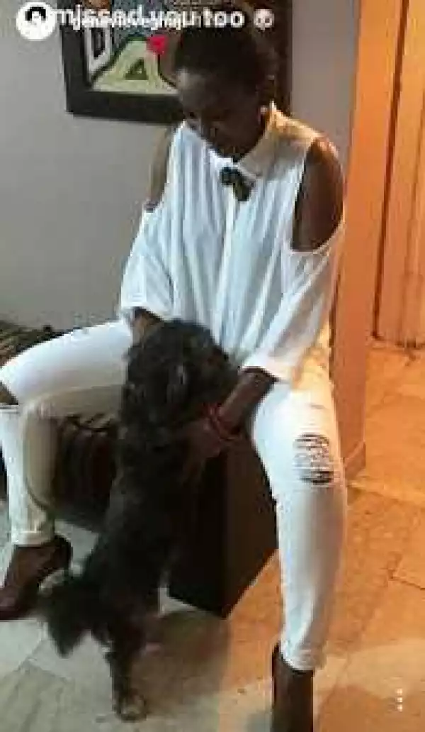Genevieve Nnaji Shows Off Her Pet Dog In All White Glam Photos